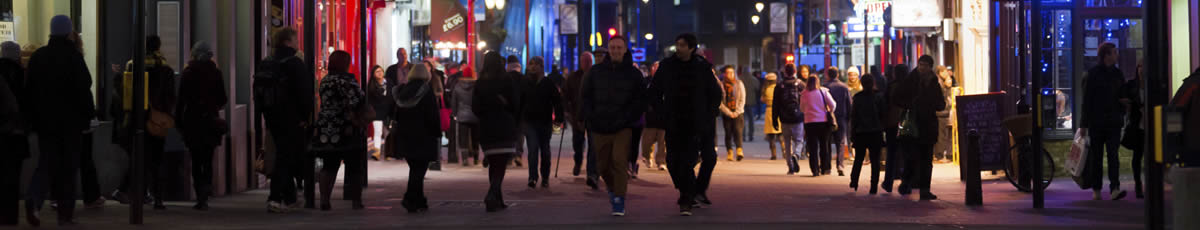 Night time pedestrians in city location
